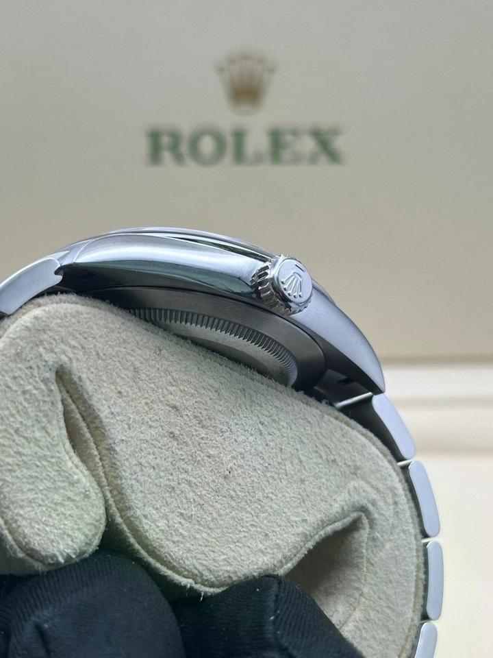 ROLEX OYSTER PERPETUAL PINK DIAL