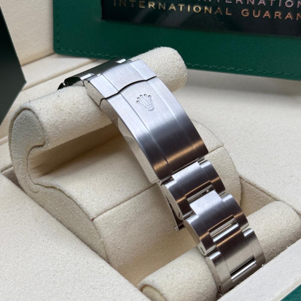 ROLEX OYSTER PERPETUAL RED DIAL