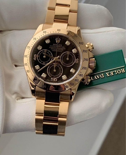 ROLEX DAYTONA GOLD BLACK DIAL DIAMOND