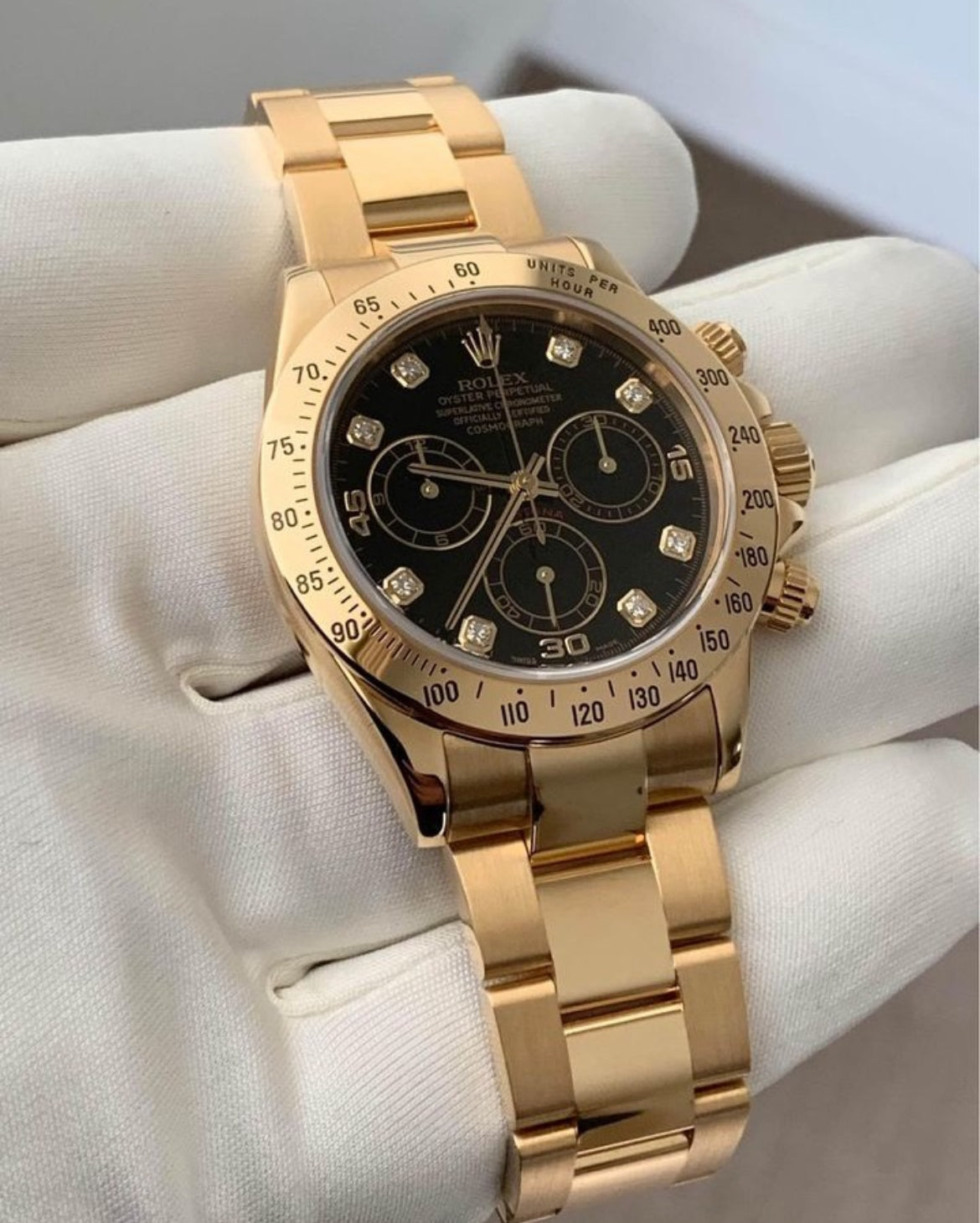 ROLEX DAYTONA GOLD BLACK DIAL DIAMOND