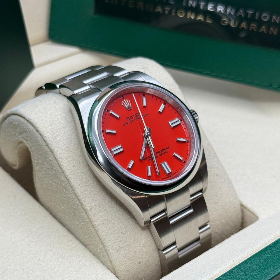 ROLEX OYSTER PERPETUAL RED DIAL