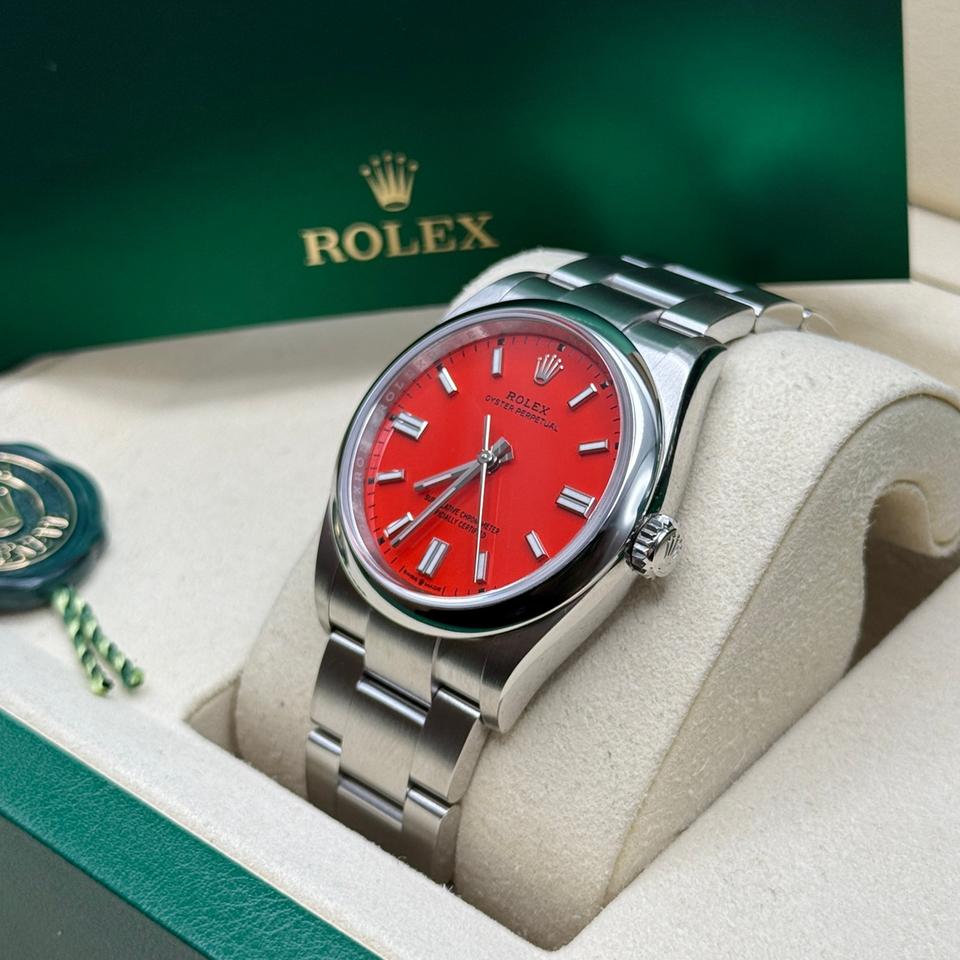 ROLEX OYSTER PERPETUAL RED DIAL