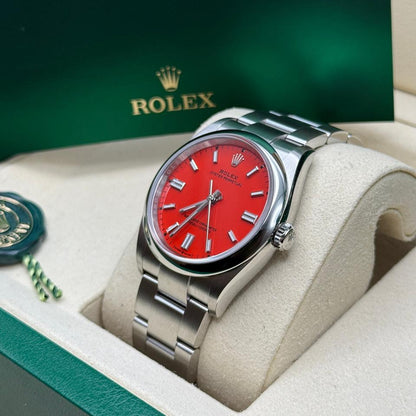 ROLEX OYSTER PERPETUAL RED DIAL